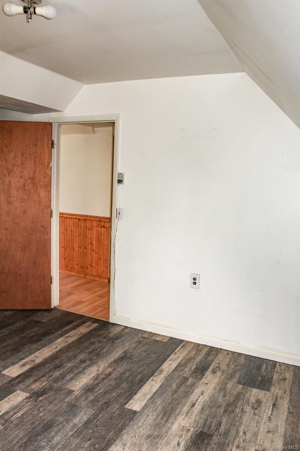 29 Schultz Road White Lake, NY 12786 - Photo 15 of 28 an empty room with wooden floor and windows