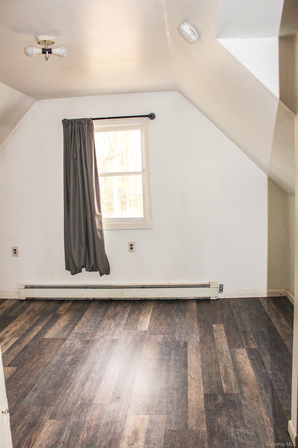 29 Schultz Road White Lake, NY 12786 - Photo 18 of 28 an empty room with wooden floor and windows