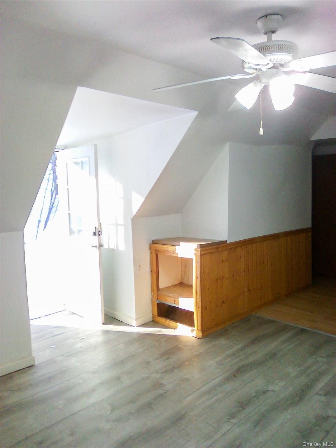 29 Schultz Road White Lake, NY 12786 - Photo 2 of 17 an empty room with wooden floor and door