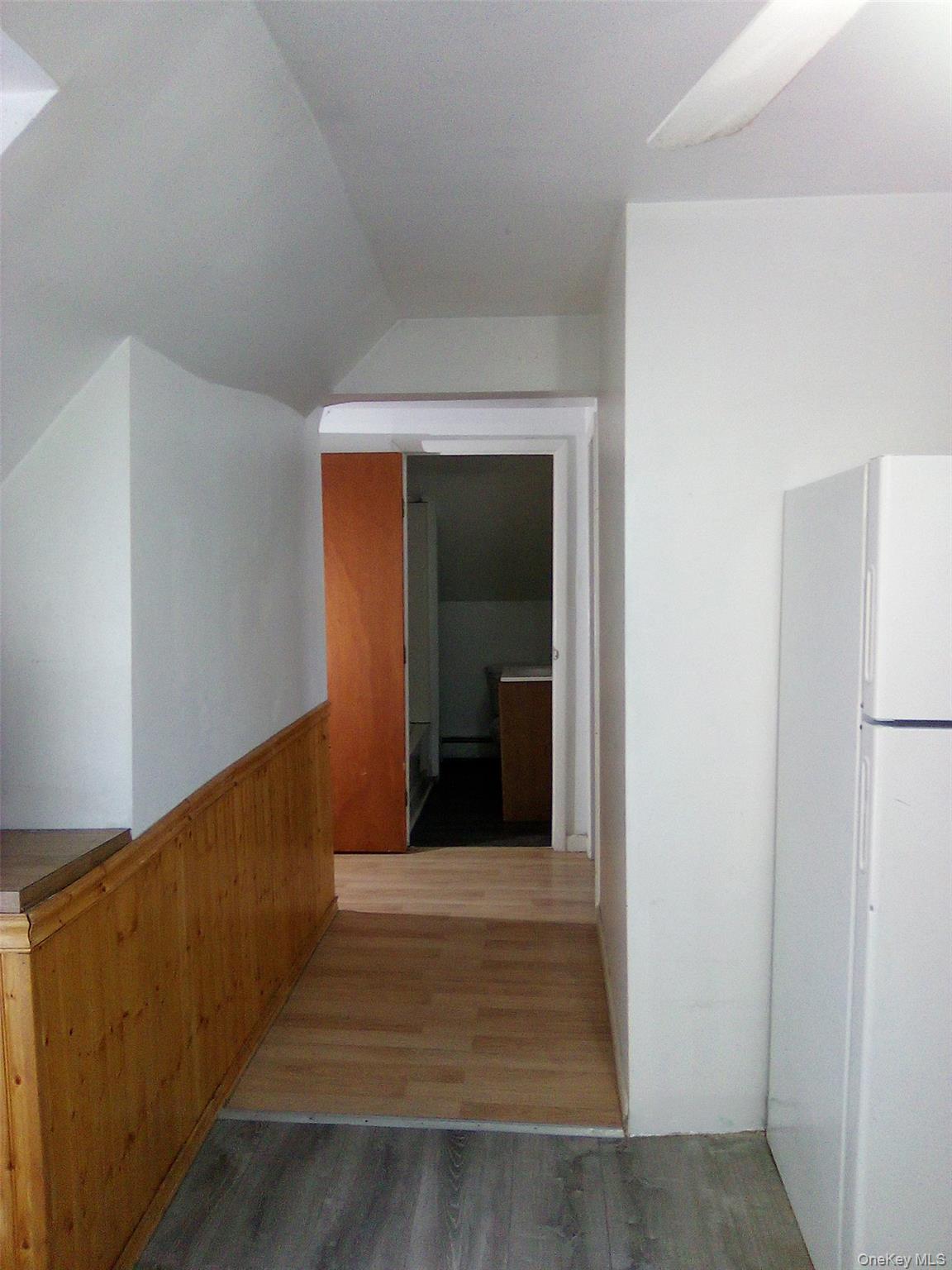29 Schultz Road White Lake, NY 12786 - Photo 3 of 28 a view of a hallway with wooden floor and entryway