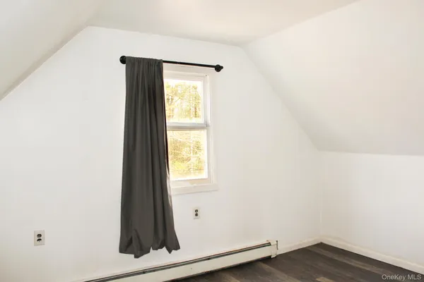 an empty room with window