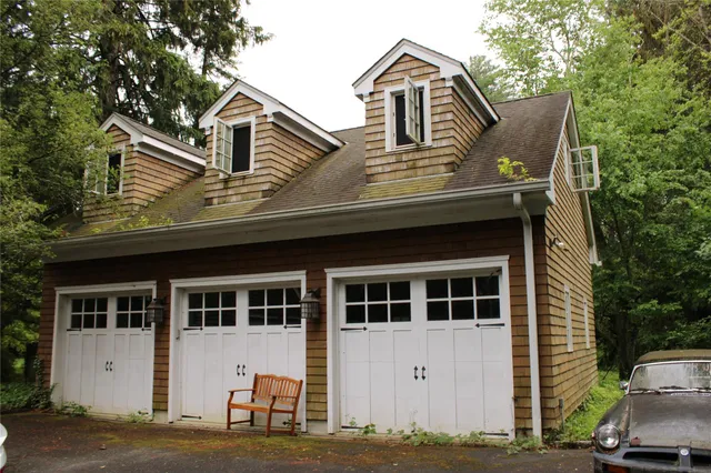 a front view of a house with a garage
