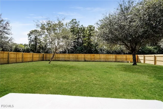 a view of yard with trees