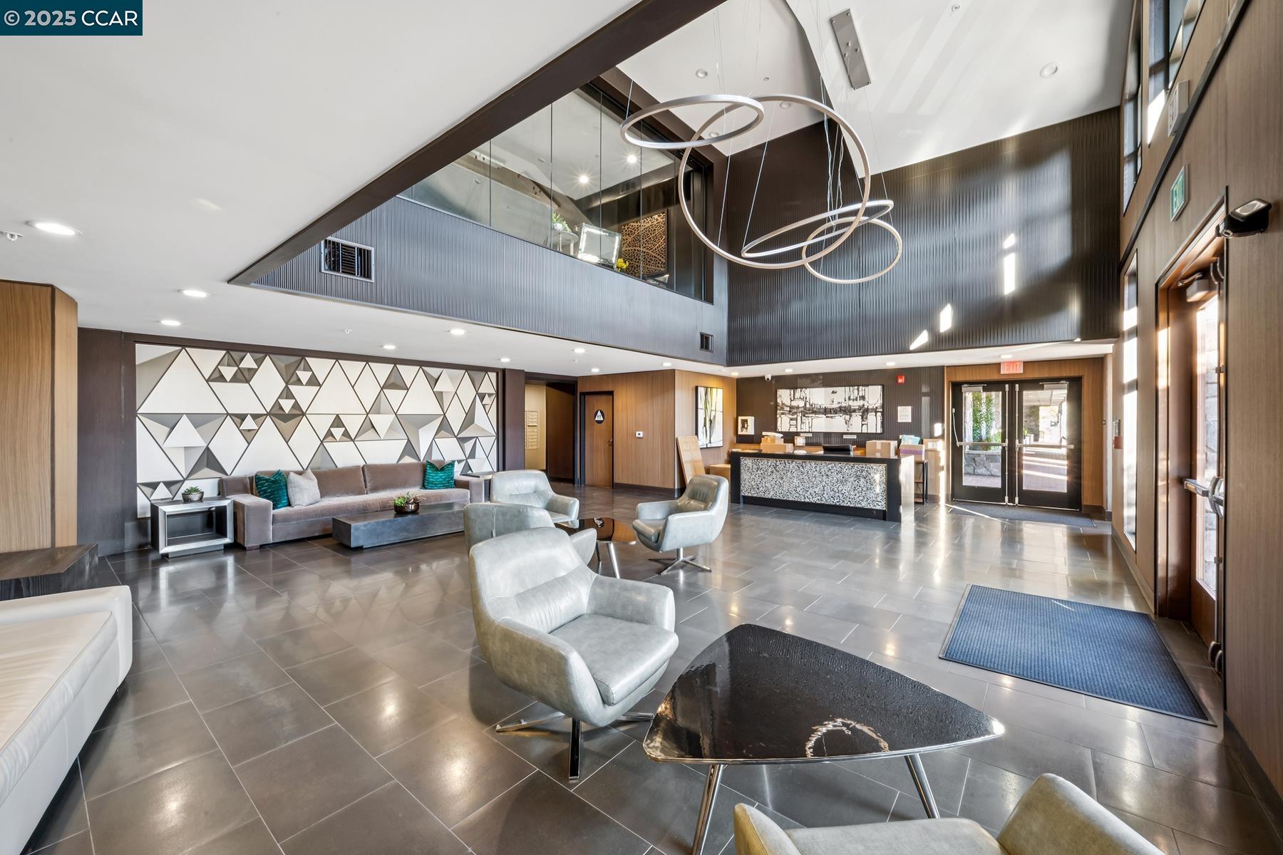 1000 Dewing Avenue, Unit 214 Lafayette, CA 94549 - Photo 20 of 23 a gym room with lots of furniture and a large window