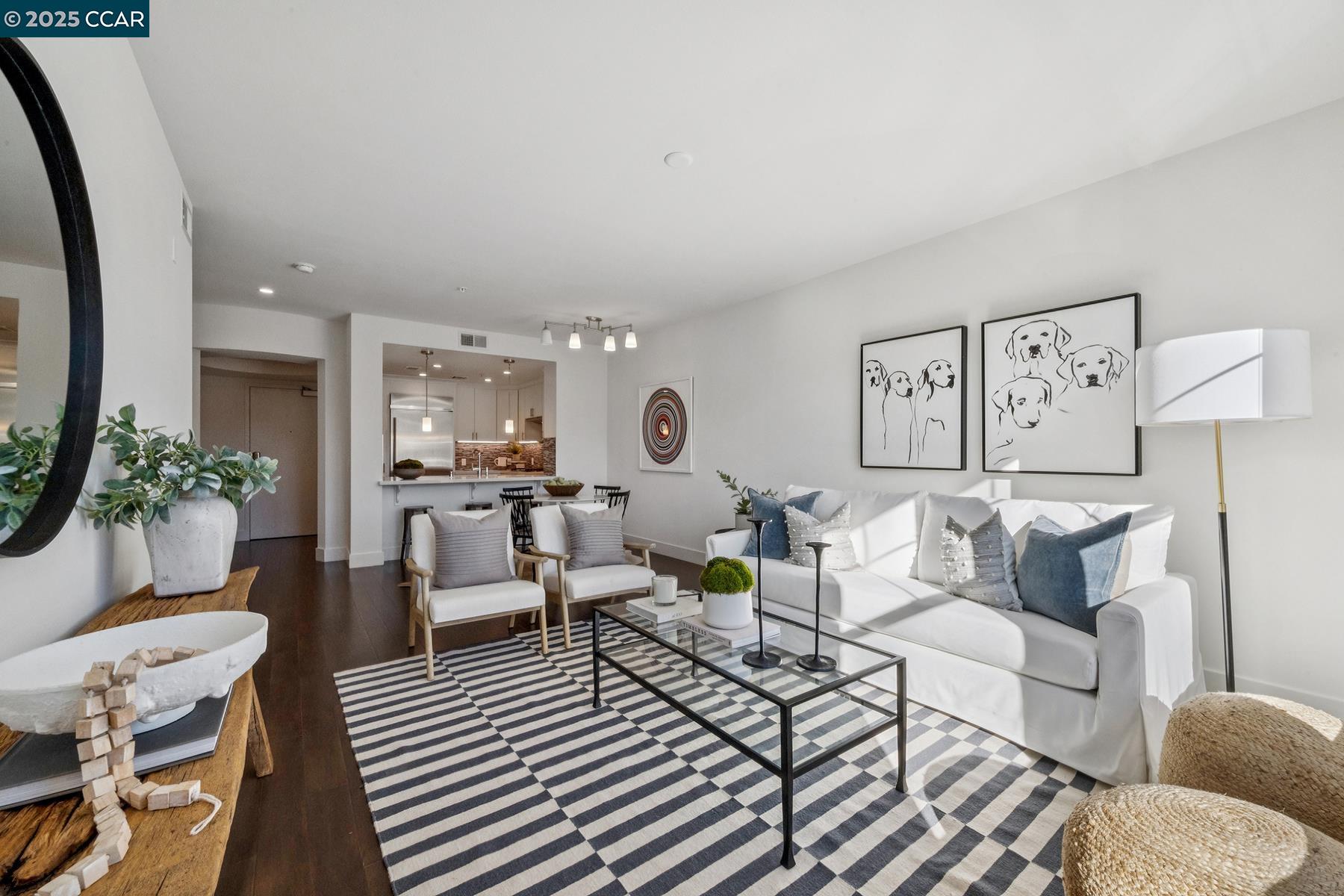 1000 Dewing Avenue, Unit 214 Lafayette, CA 94549 - Photo 8 of 23 a living room with furniture and a painting on the wall