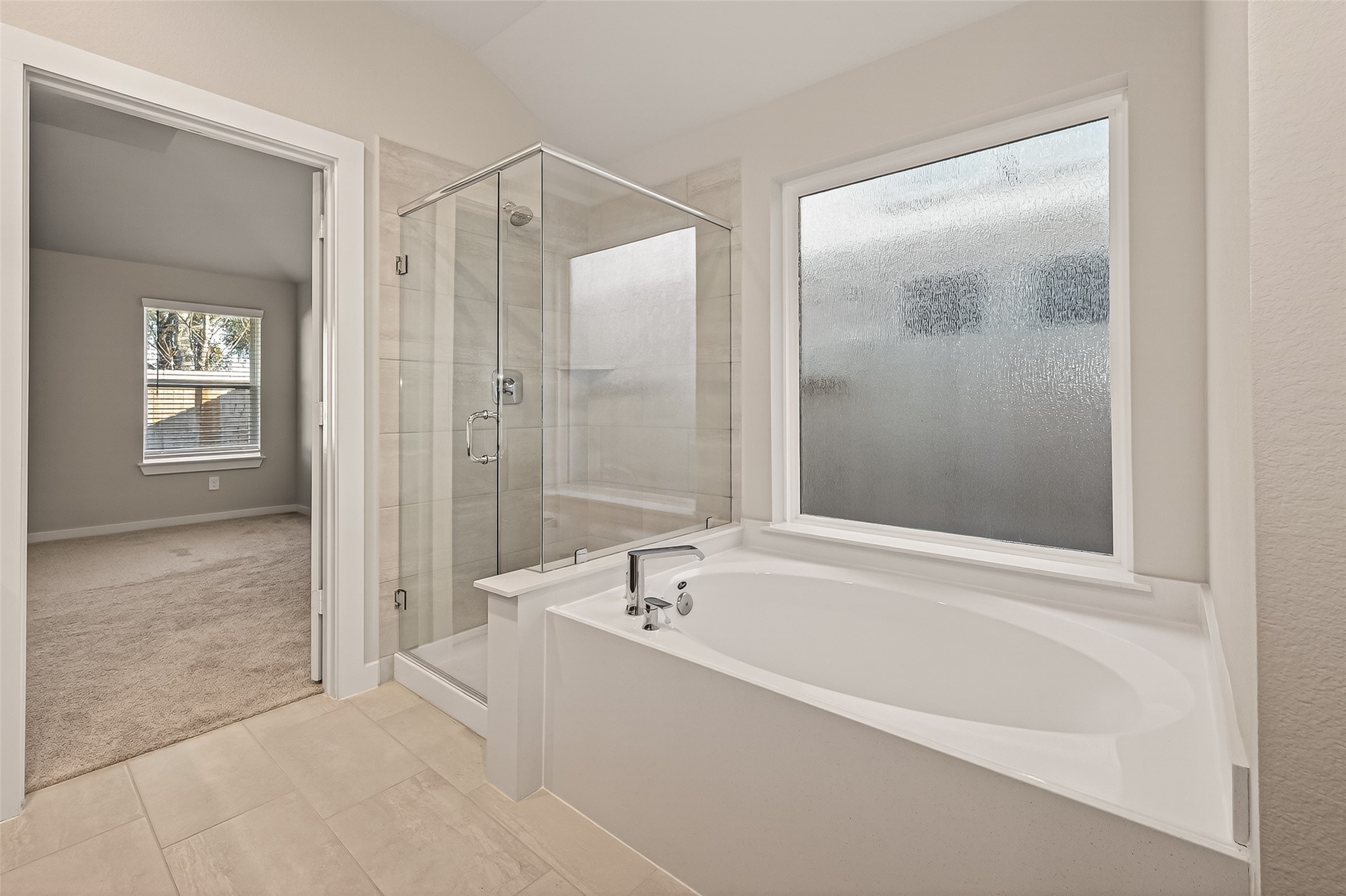 15710 Telge Road Cypress, TX 77429 - Photo 14 of 32 Private primary suite for comfort and relaxation