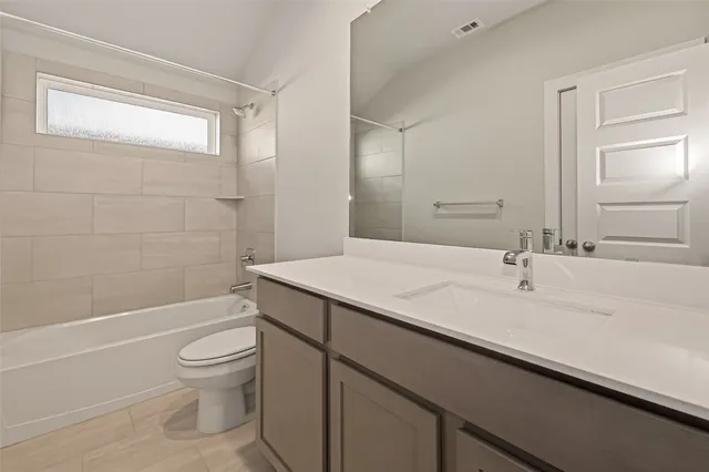 an empty room with closet area