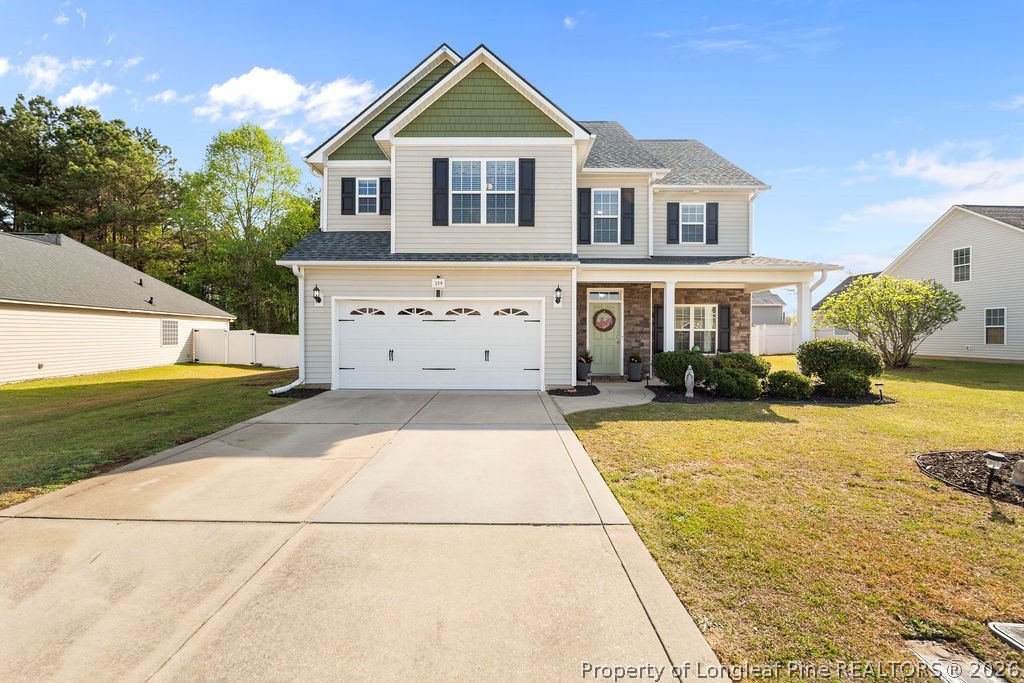 259 Bayleaf Drive Raeford, NC 28376 - Photo 1 of 46 a front view of a house with a yard