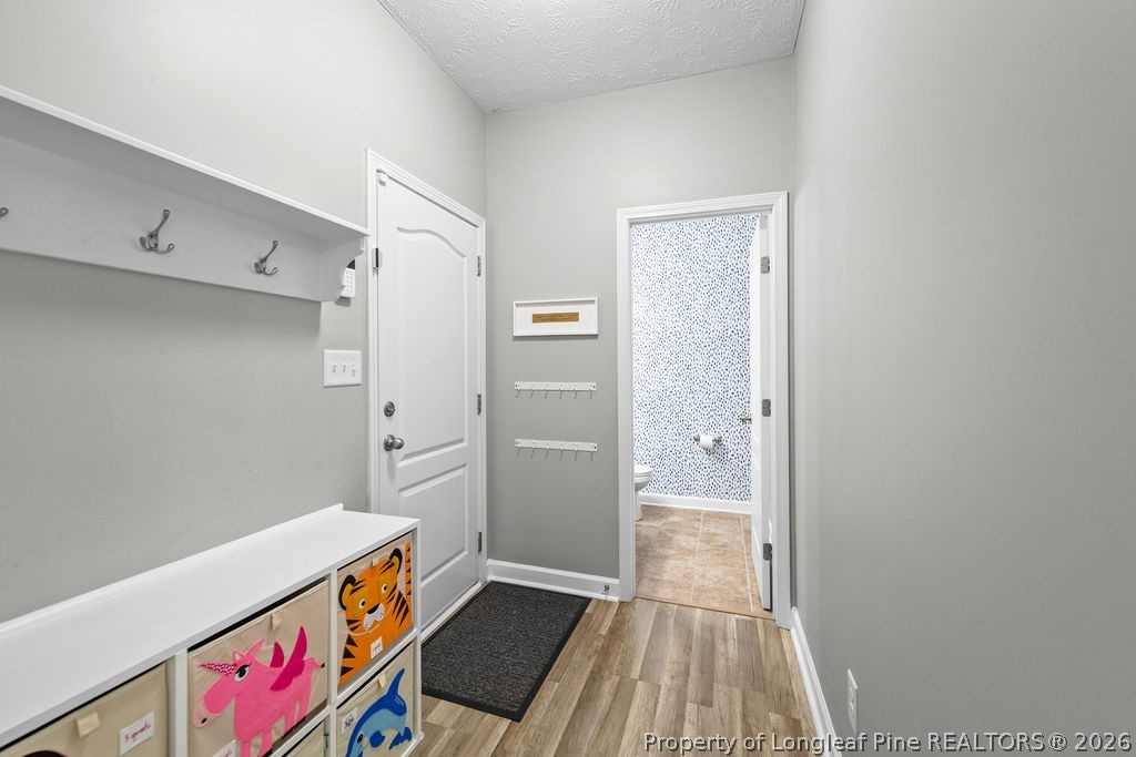 259 Bayleaf Drive Raeford, NC 28376 - Photo 15 of 46 a area with wooden floor and natural light