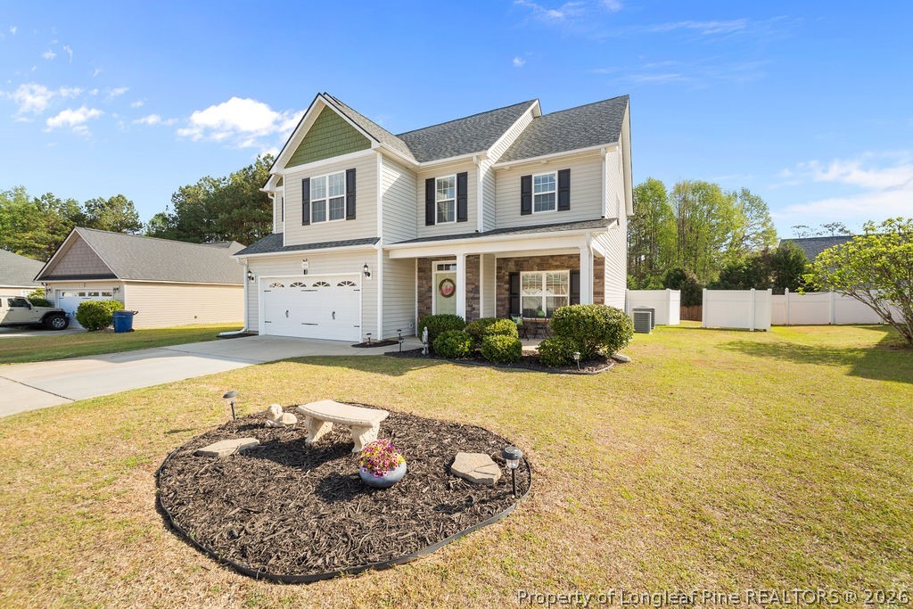 259 Bayleaf Drive Raeford, NC 28376 - Photo 2 of 46 a view of a house with a swimming pool