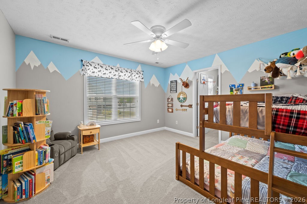 259 Bayleaf Drive Raeford, NC 28376 - Photo 22 of 46 a view of a livingroom with furniture and windows