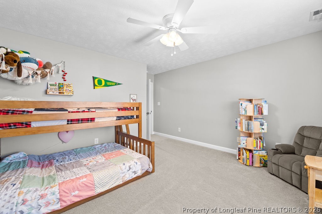 259 Bayleaf Drive Raeford, NC 28376 - Photo 23 of 46 a room with furniture and a couch