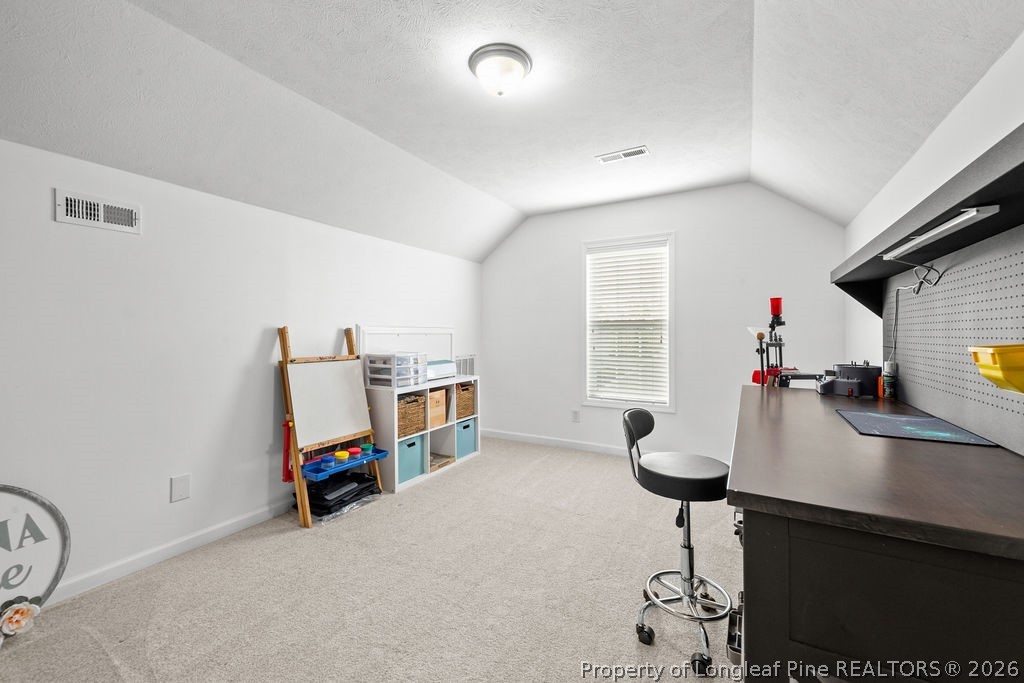 259 Bayleaf Drive Raeford, NC 28376 - Photo 29 of 46 a room with furniture and a window