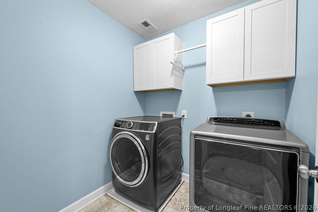 259 Bayleaf Drive Raeford, NC 28376 - Photo 34 of 46 a utility room with dryer and washer