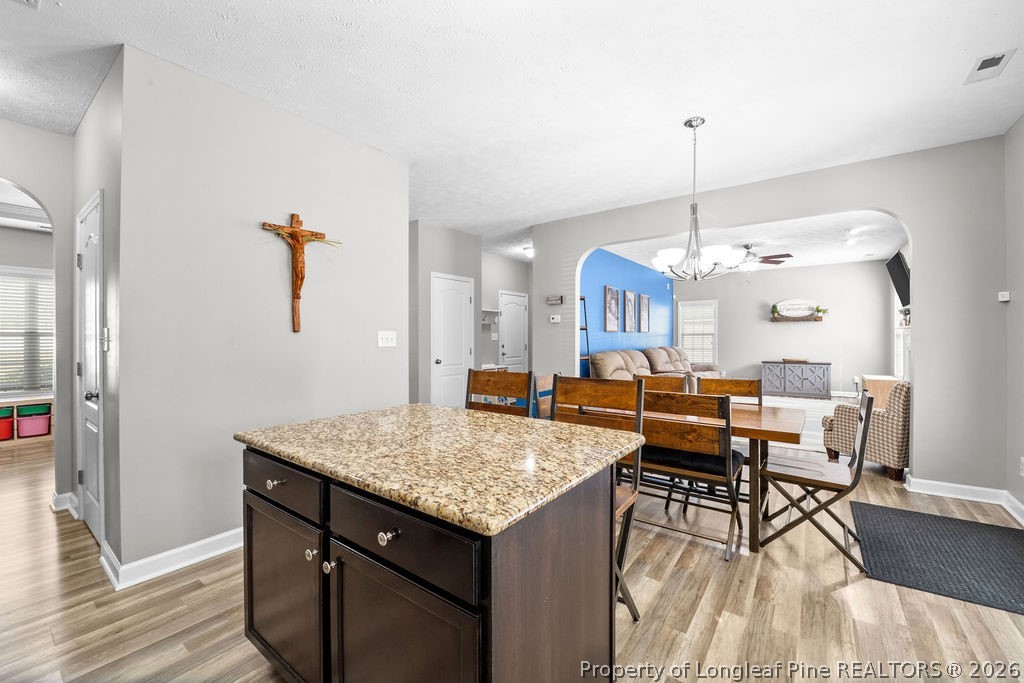259 Bayleaf Drive Raeford, NC 28376 - Photo 10 of 46 a view of a kitchen and dining room