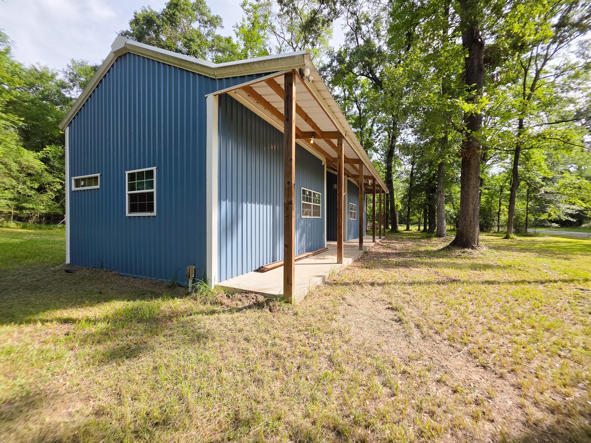 437 East Lumbermans Road Onalaska, TX 77360 - Photo 11 of 15 a view of backyard of house with green space