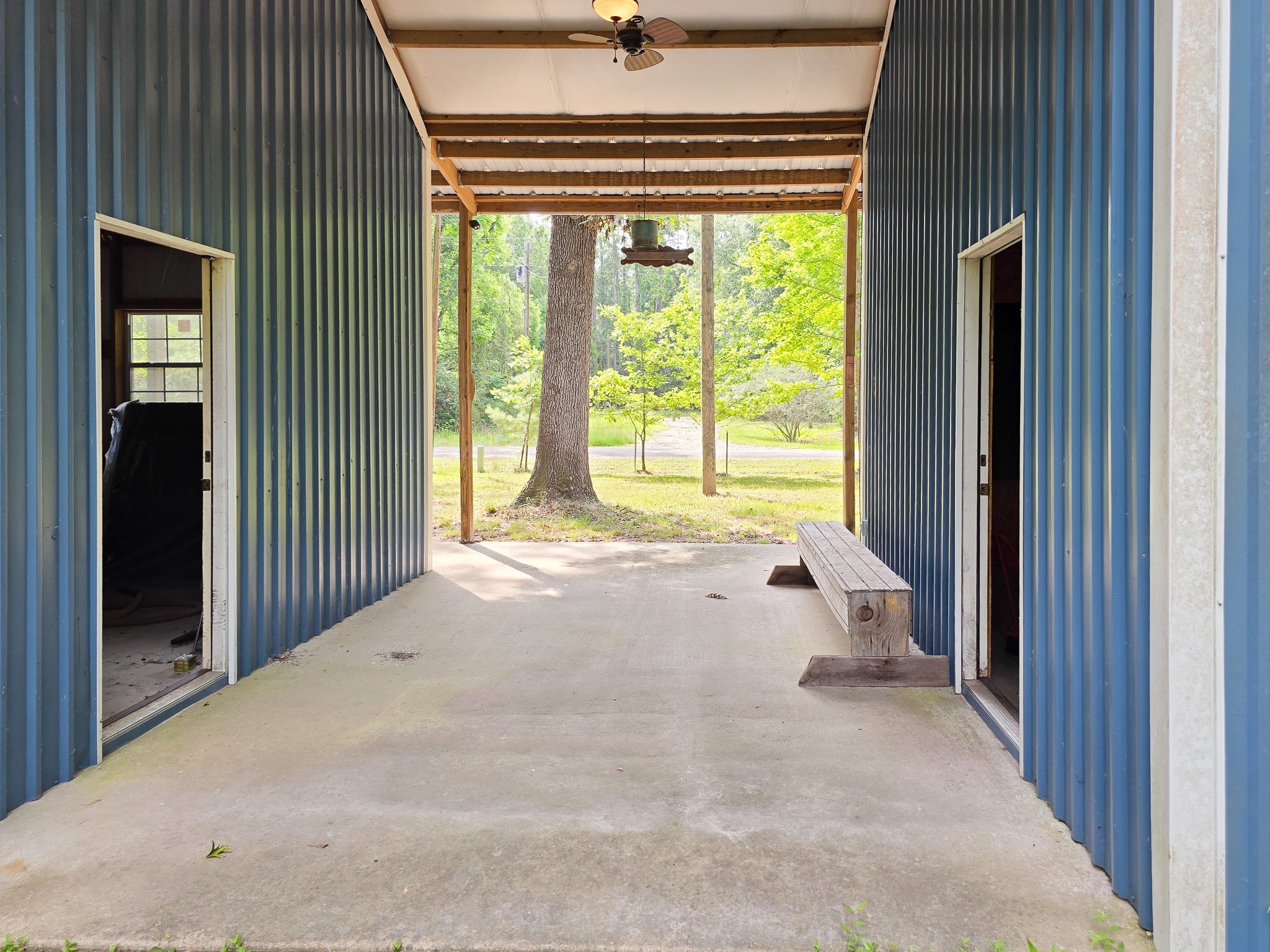 437 East Lumbermans Road Onalaska, TX 77360 - Photo 12 of 15 a view of an empty room with a fireplace
