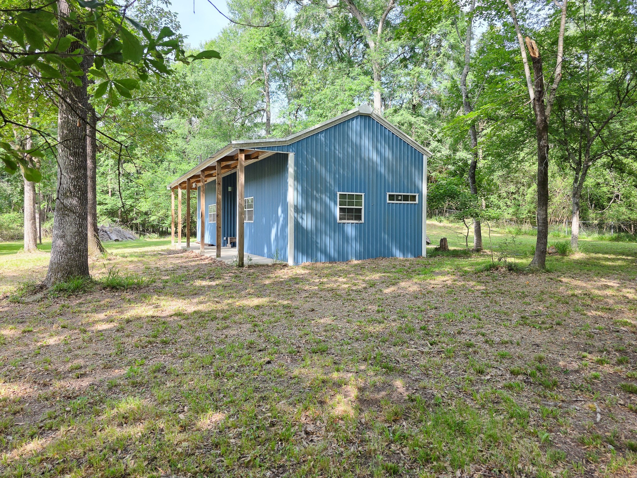 437 East Lumbermans Road Onalaska, TX 77360 - Photo 14 of 15 a house view with a outdoor space