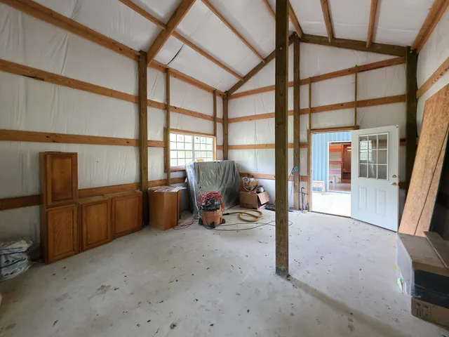 a view of hallway with seating area