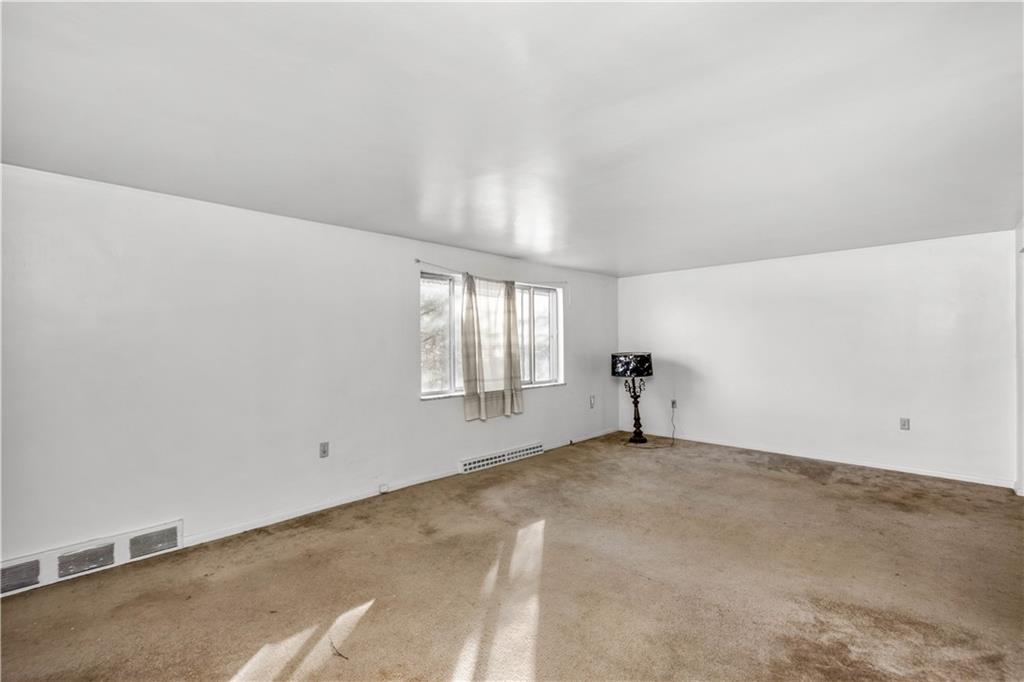 150 Pear Orchard Road Coraopolis, PA 15108 - Photo 4 of 13 a view of an empty room with a window
