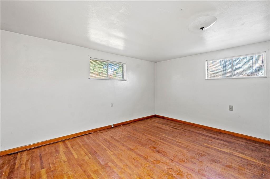 150 Pear Orchard Road Coraopolis, PA 15108 - Photo 10 of 13 a view of an empty room with wooden floor