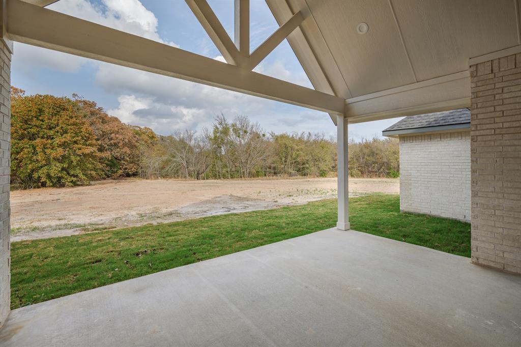 1844 County Road 2320 Terrell, TX 75160 - Photo 11 of 40 a view of a house with a yard