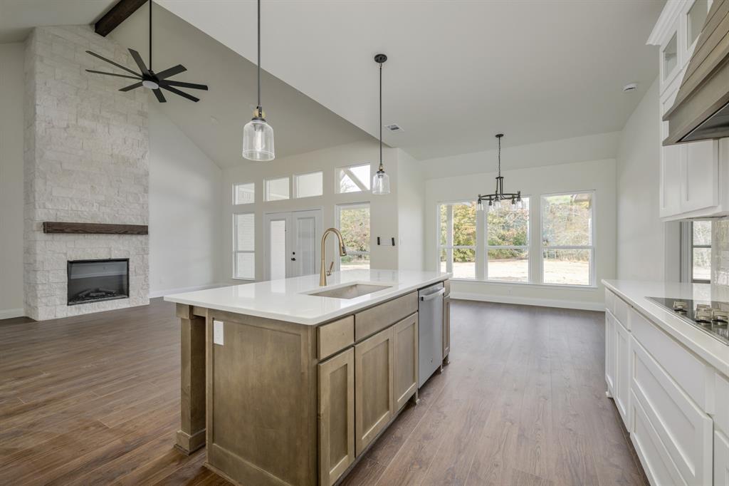 1844 County Road 2320 Terrell, TX 75160 - Photo 19 of 40 a kitchen with a sink appliances and cabinets