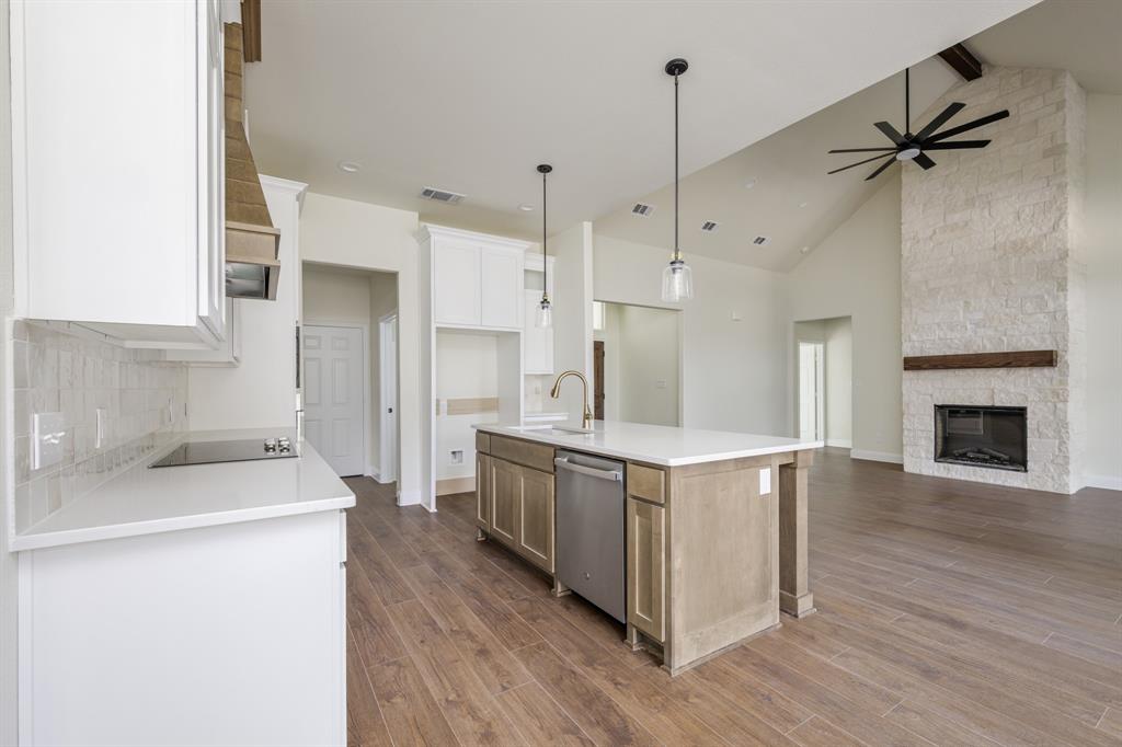 1844 County Road 2320 Terrell, TX 75160 - Photo 20 of 40 a kitchen with stainless steel appliances a stove a sink and a refrigerator