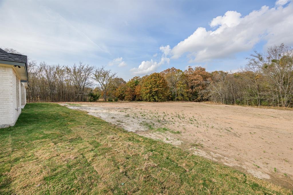 1844 County Road 2320 Terrell, TX 75160 - Photo 8 of 40 a view of a yard