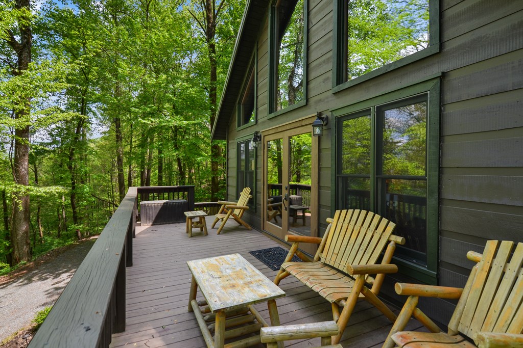 1213 Mountain Oak Road Ellijay, GA 30536 - Photo 35 of 65 an outdoor sitting area with furniture and garden view