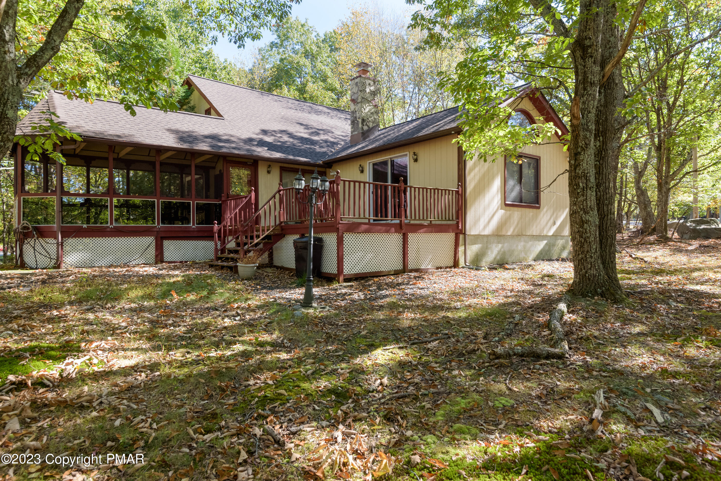 2206 Chatham Drive Bushkill, PA 18324 - Photo 11 of 25 a view of a house with backyard and sitting area