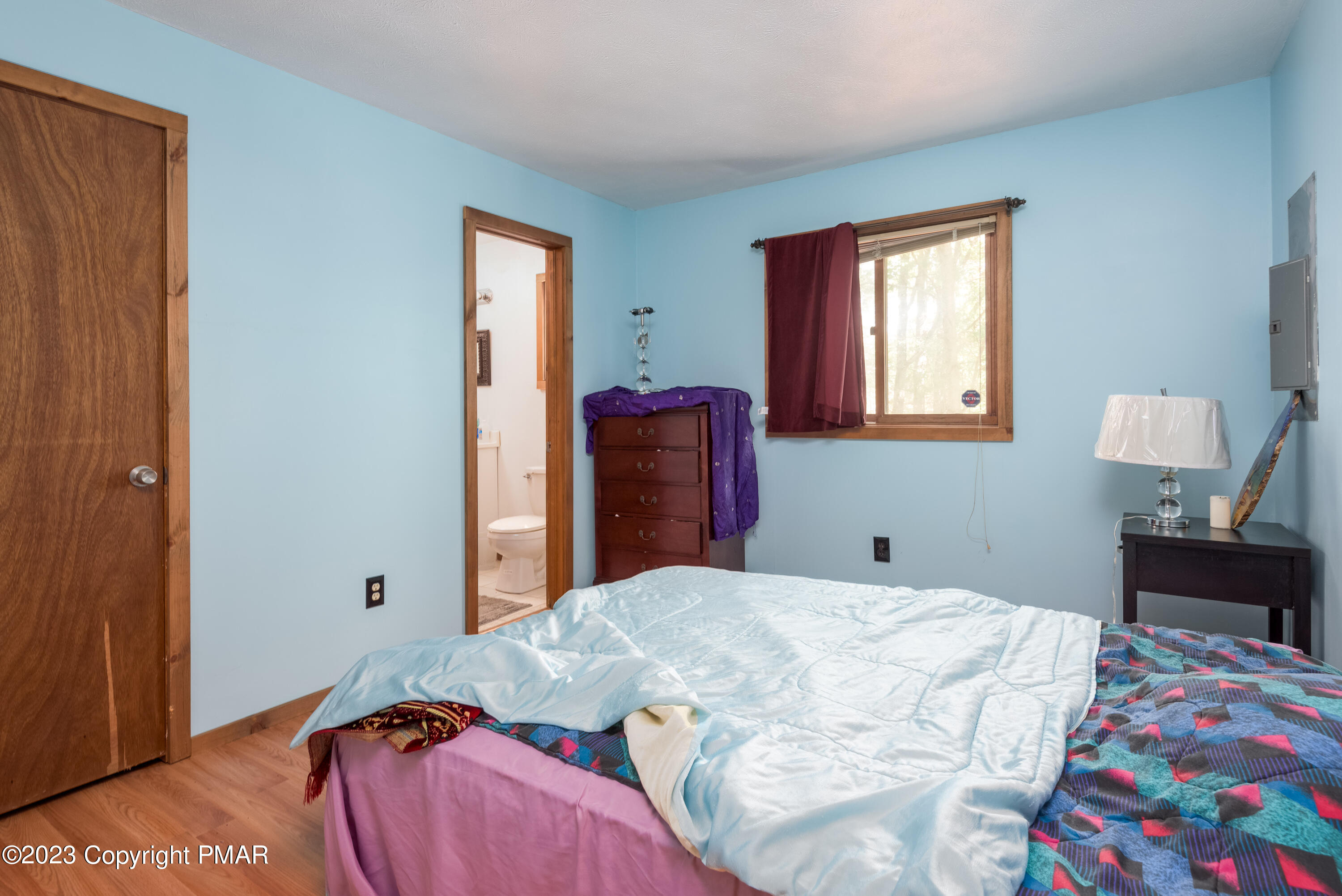 2206 Chatham Drive Bushkill, PA 18324 - Photo 14 of 25 a bedroom with a bed and a window