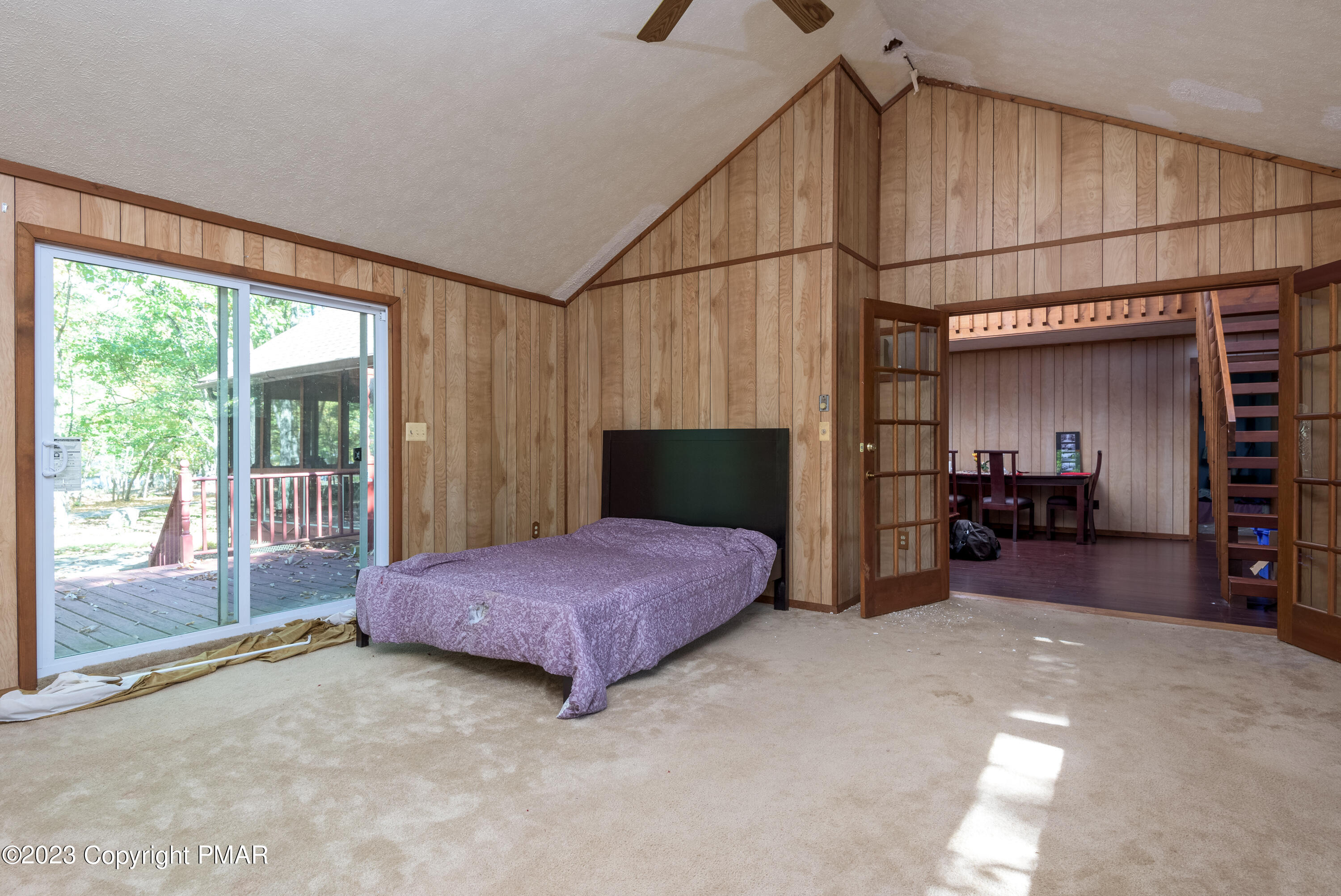 2206 Chatham Drive Bushkill, PA 18324 - Photo 16 of 25 a bedroom with a bed and large window