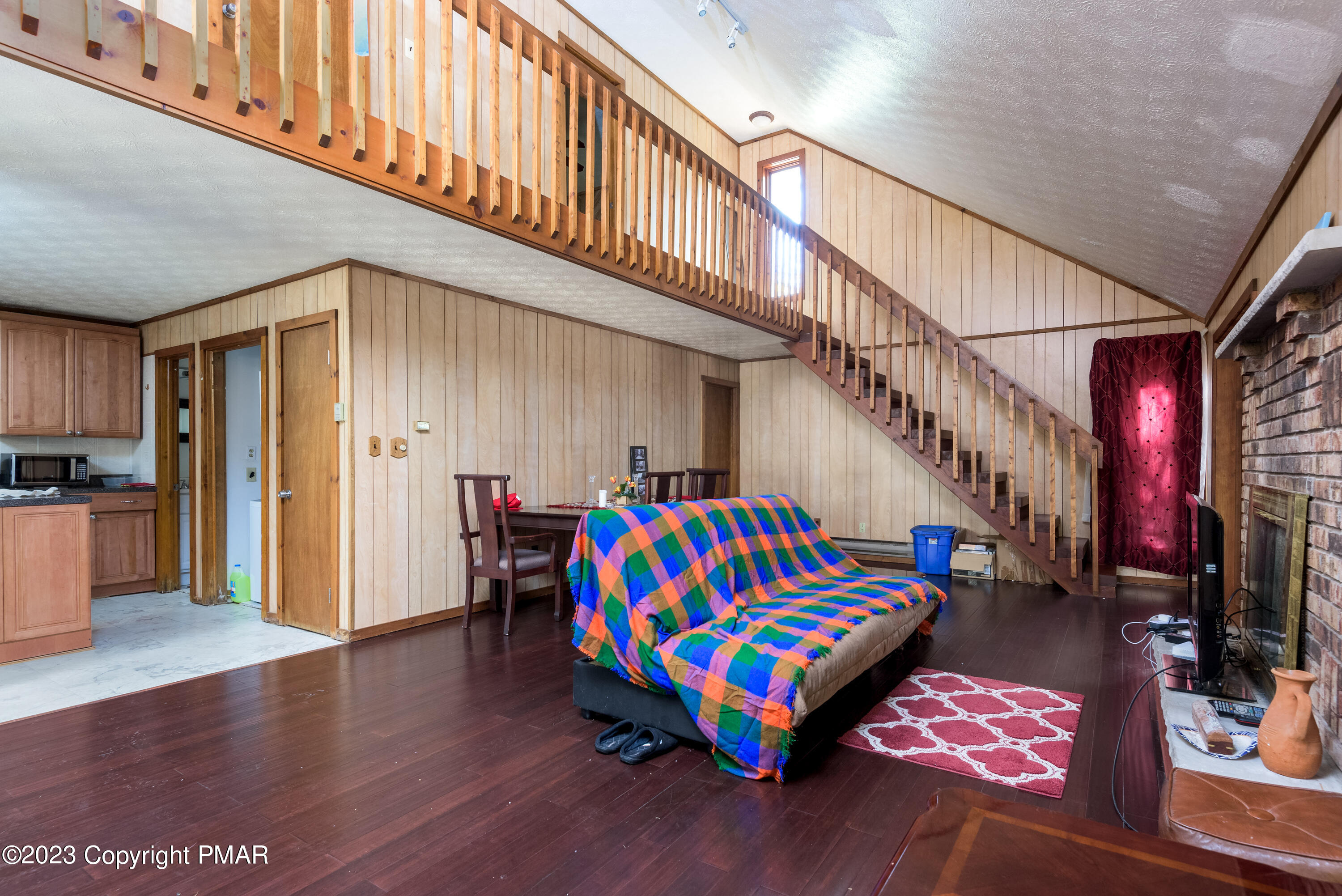 2206 Chatham Drive Bushkill, PA 18324 - Photo 21 of 25 a room with lots of white furniture and stairs