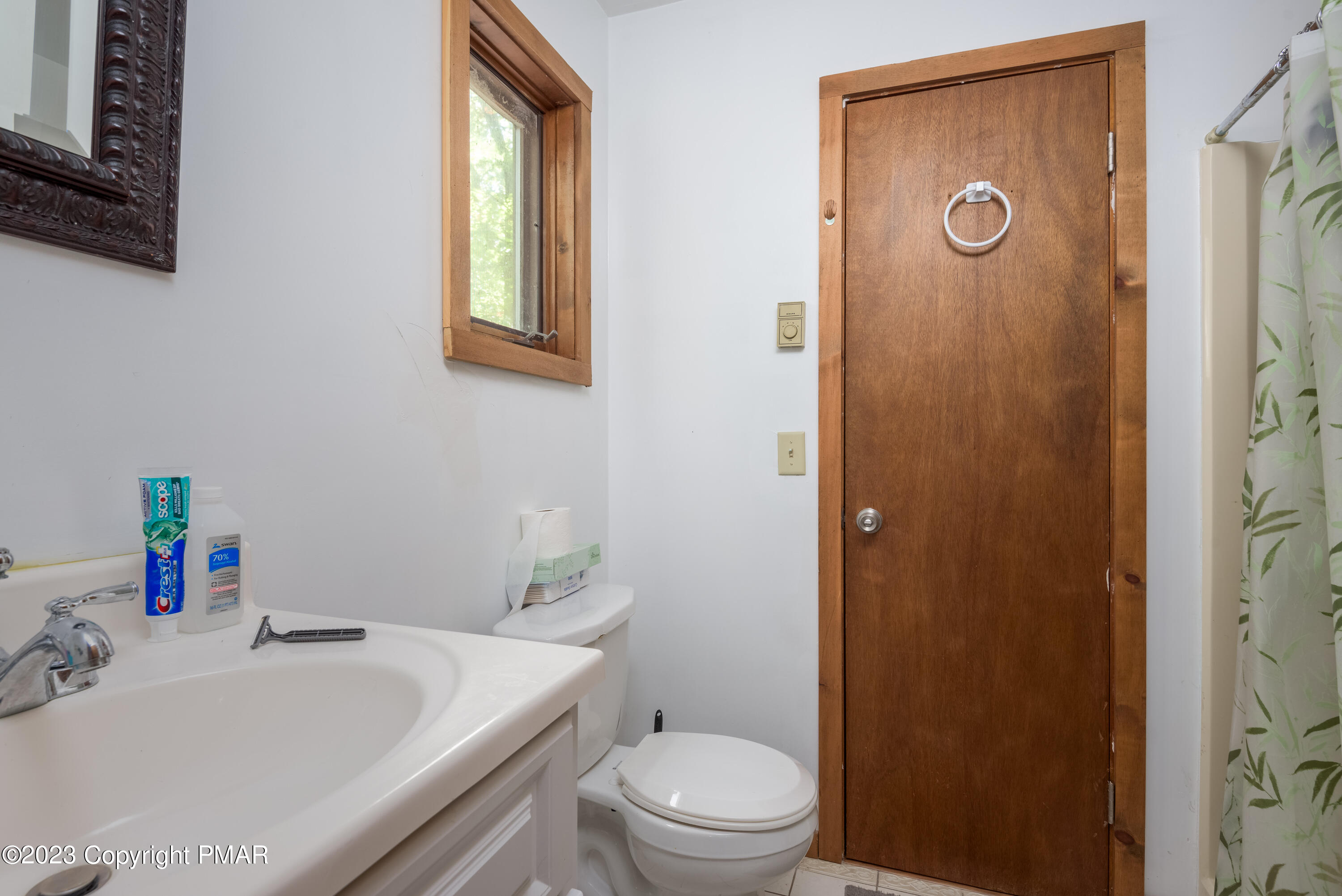 2206 Chatham Drive Bushkill, PA 18324 - Photo 6 of 25 a bathroom with a sink a toilet and shower