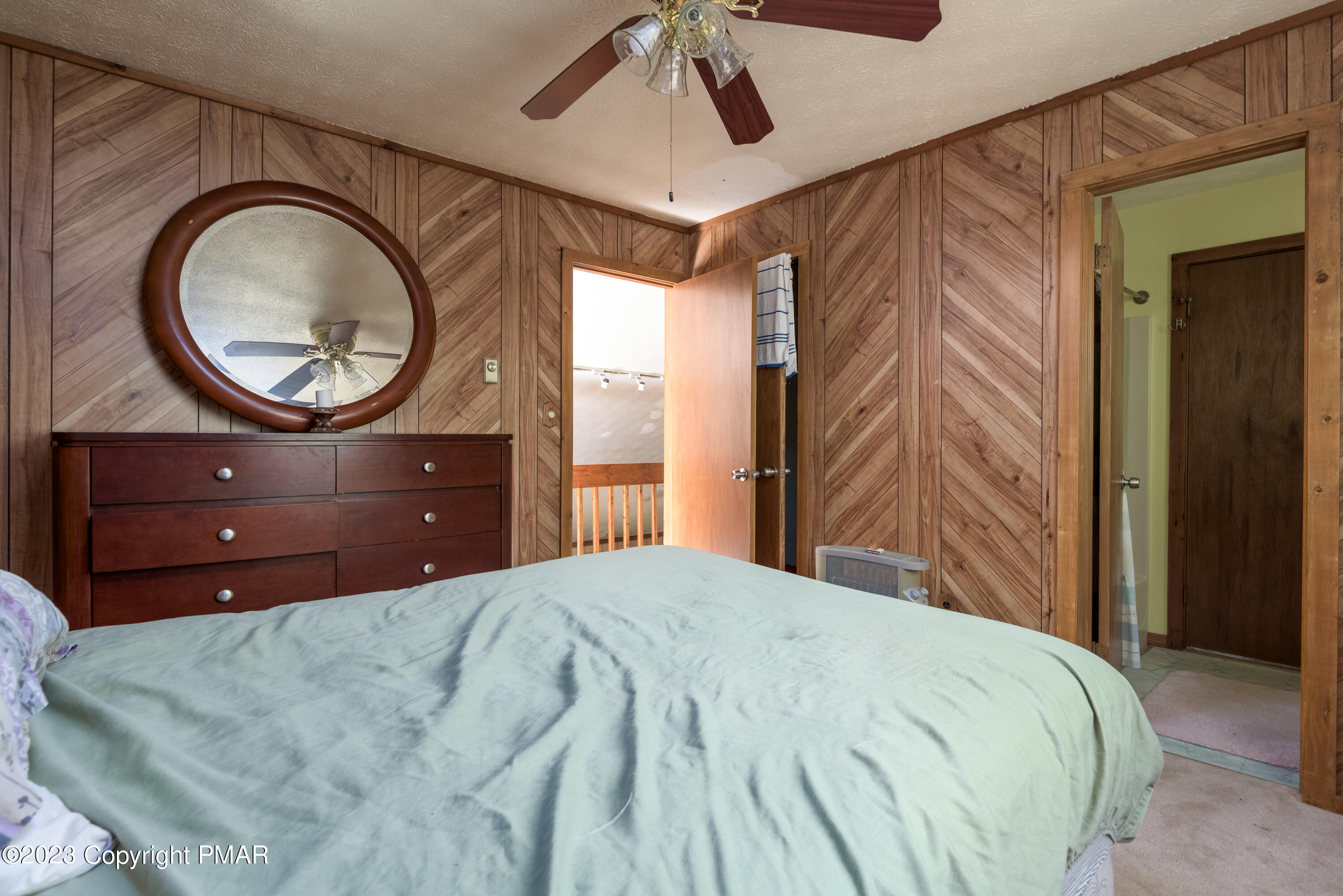 2206 Chatham Drive Bushkill, PA 18324 - Photo 7 of 25 a bedroom with a large bed and a dresser