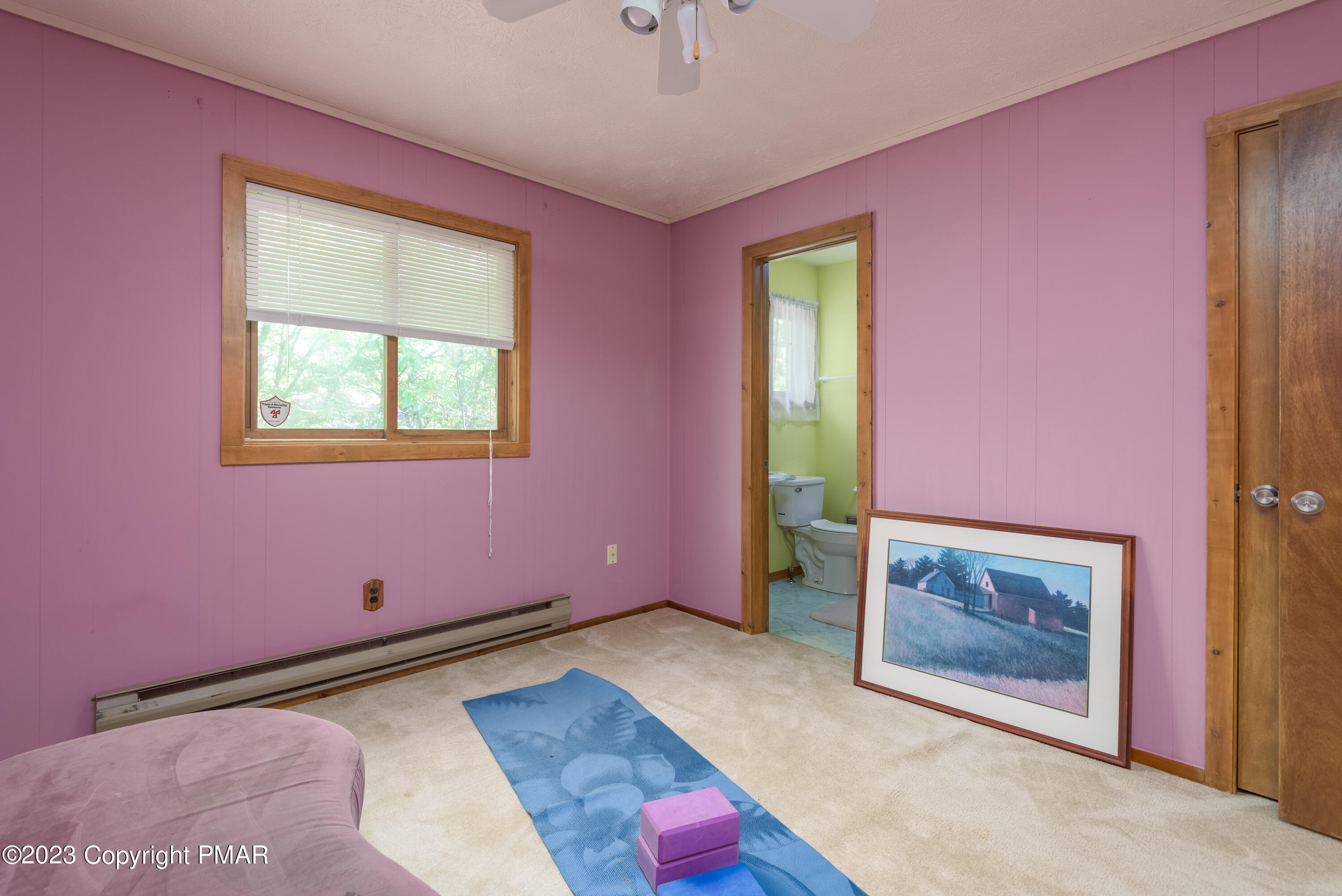 2206 Chatham Drive Bushkill, PA 18324 - Photo 8 of 25 a room with furniture and a window