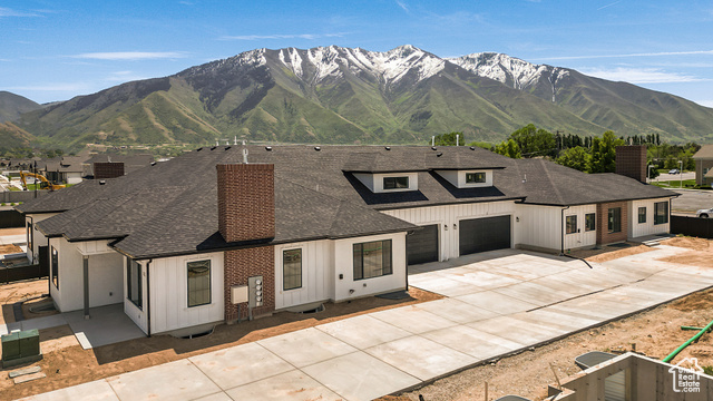 1631 West Century Lane, Unit B Mapleton, UT 84664 - Photo 31 of 33 Modern inspired farmhouse with roof with shingles, a chimney, driveway, and a garage