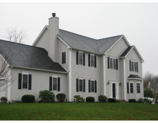 17 Boundary Stone Road Sutton, MA 01590 - Photo 1 of 24 a front view of a house with a yard