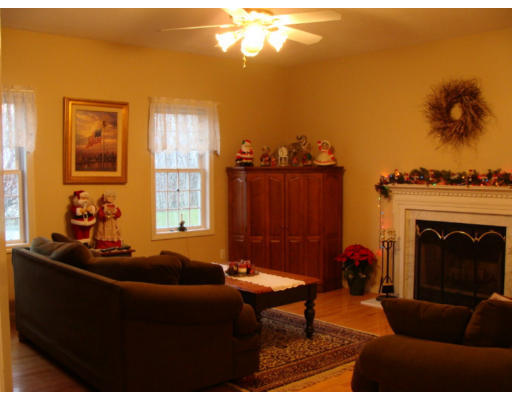 17 Boundary Stone Road Sutton, MA 01590 - Photo 12 of 24 a living room with furniture a window and a fireplace