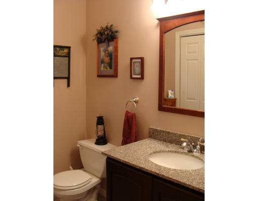 17 Boundary Stone Road Sutton, MA 01590 - Photo 19 of 24 a bathroom with a granite countertop sink toilet and mirror