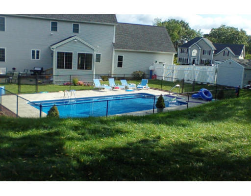 17 Boundary Stone Road Sutton, MA 01590 - Photo 2 of 24 a front view of house with yard and outdoor seating
