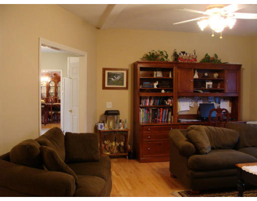 17 Boundary Stone Road Sutton, MA 01590 - Photo 10 of 24 a living room with furniture a walk in closet and a window