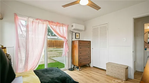 a living room with a couch and a window