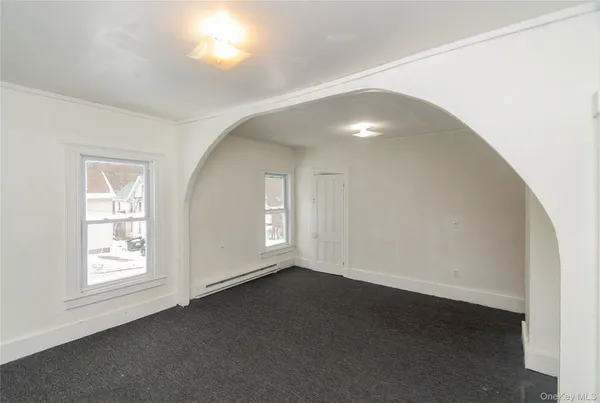 an empty room with windows