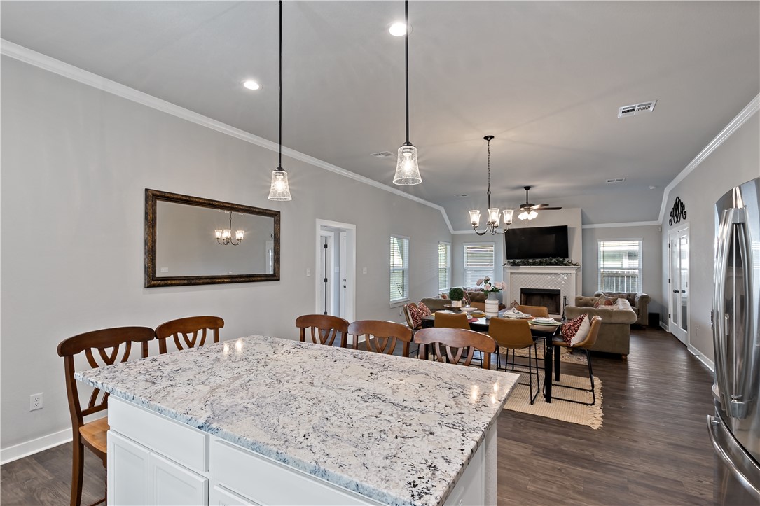 3161 Normandy Way Bryan, TX 77808 - Photo 13 of 27 a view of a dining room with furniture