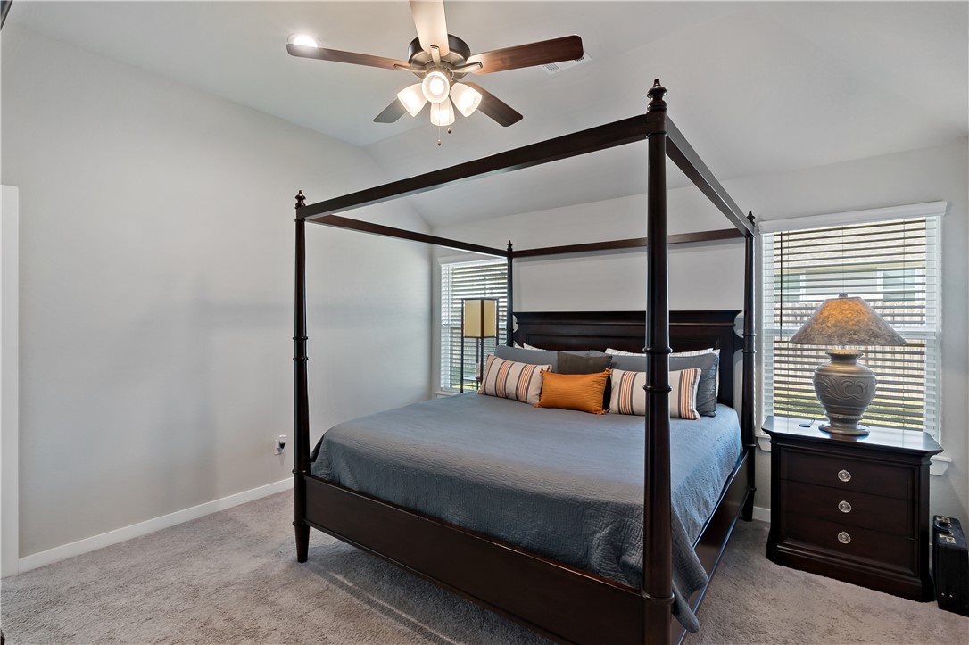 3161 Normandy Way Bryan, TX 77808 - Photo 16 of 27 a bedroom with a bed and a closet