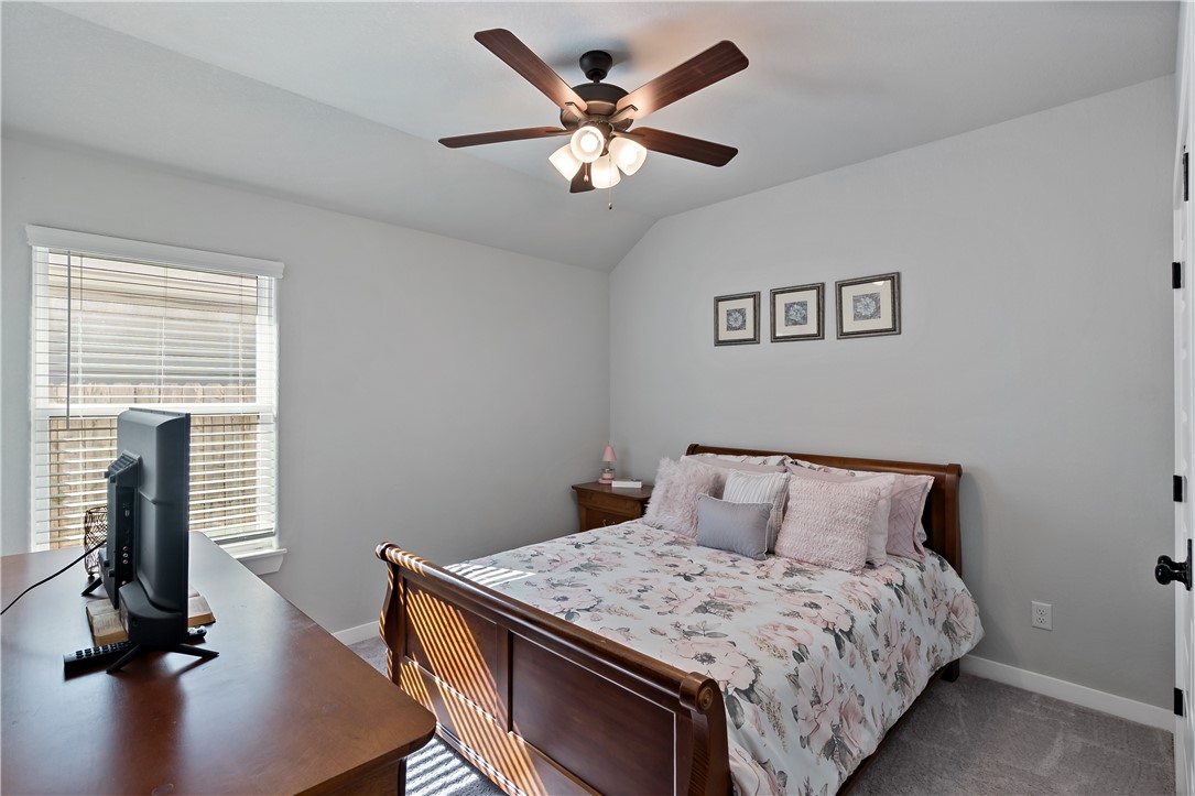 3161 Normandy Way Bryan, TX 77808 - Photo 19 of 27 a bedroom with bed and a window