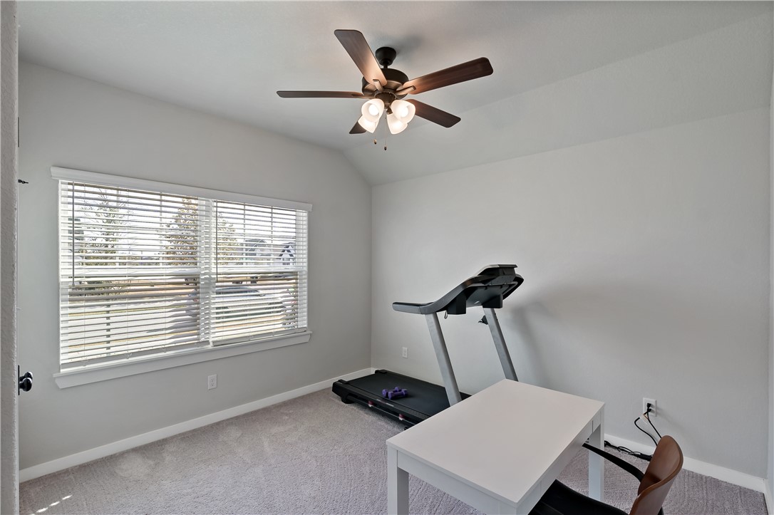 3161 Normandy Way Bryan, TX 77808 - Photo 20 of 27 a room with window and ceiling fan