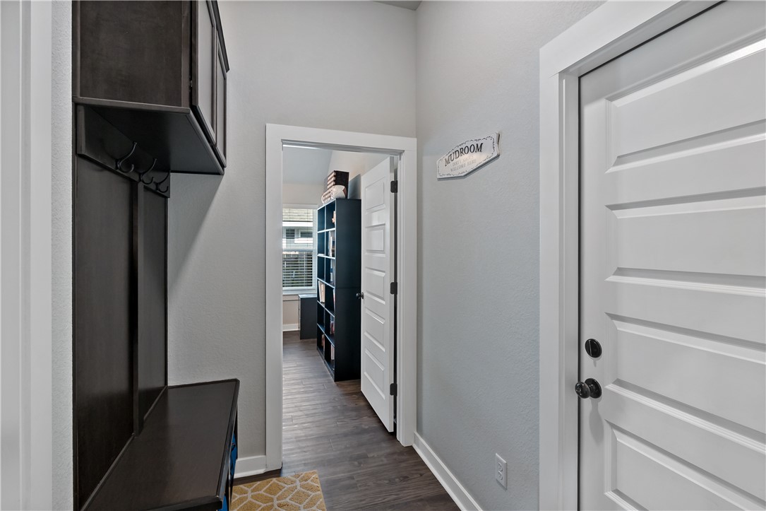 3161 Normandy Way Bryan, TX 77808 - Photo 23 of 27 a view of hallway with wooden floor